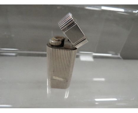 A Cartier white metal lighter 66583X1990