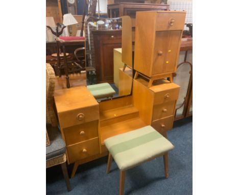 A Utility oak dressing table, bedside cabinet and a stool. (3)