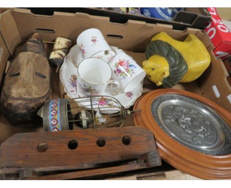 A box containing pipe racks, reproduction bird cage clock etc