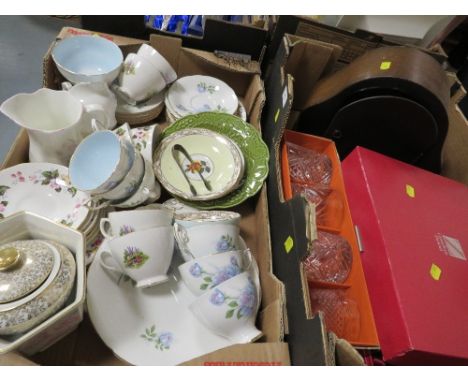Two trays of ceramics and glass ware together with a mantle clock