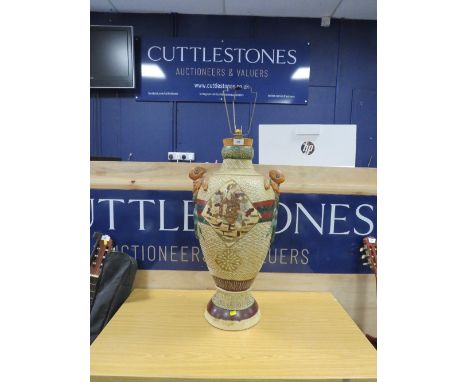 A large oriental vase converted to a table lamp