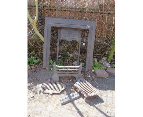 A cast fire surround and accessories