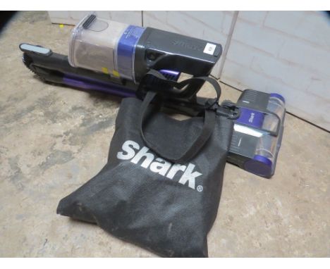 A shark rechargeable vacuum - with charger - House clearance