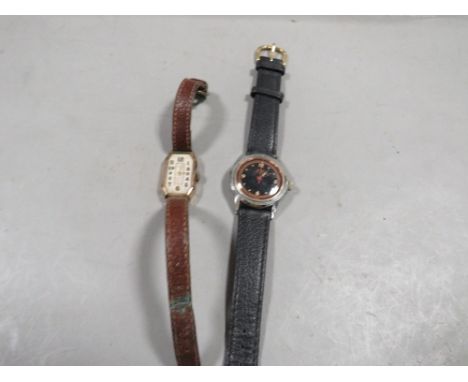 Two vintage wristwatches to include a Roma black dial shock resistant example