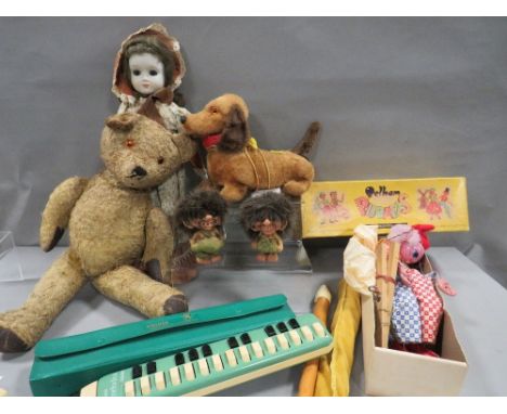 A tray of vintage toys etc to include a bear, boxed Pelham puppet etc