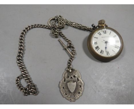 A hallmarked silver albert chain and fob together with a pocket watch A/F