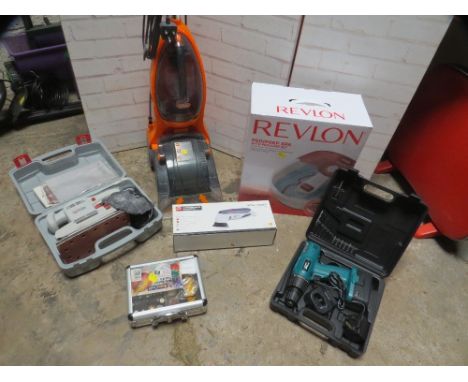 A selection of boxed items to include a Foot spa, electric tools and a carpet cleaner