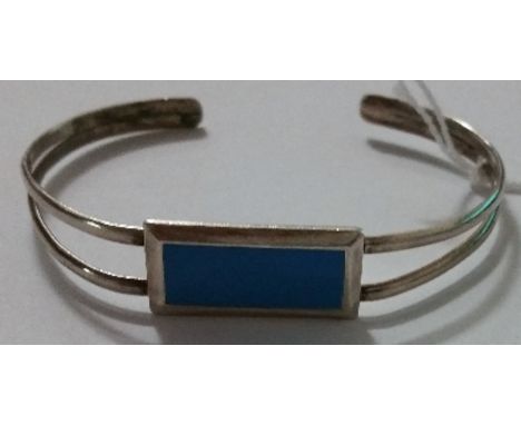 A Silver Turquoise Set Bangle. 