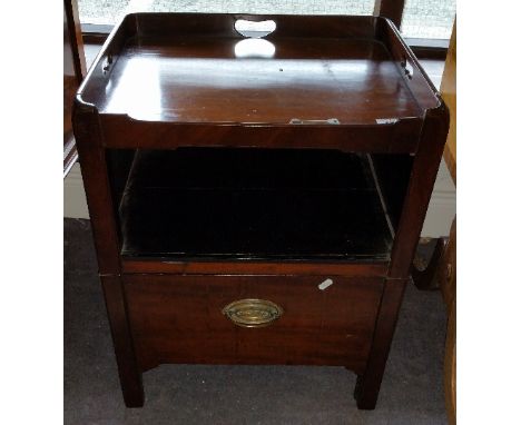 A Georgian Mahogany Night Commode; with tray top, pierced carrying handles and moulded supports.