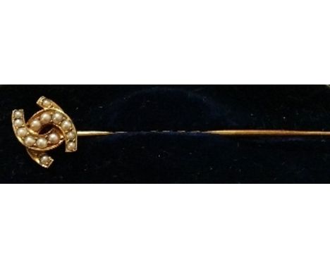 An Antique Gold Pearl Stick Pin.