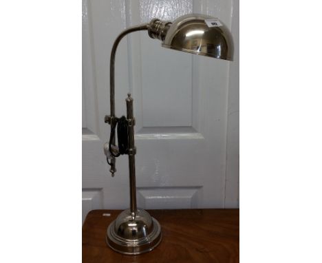 A Wonderful Pair of Chrome Desk Lamps with Adjustable Arms.