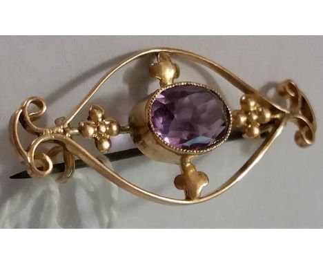 An Antique Gold Amethyst Brooch.