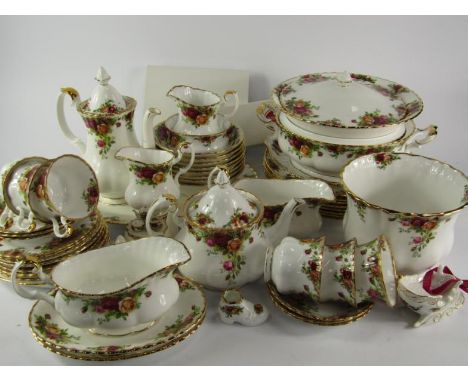 A Royal Albert porcelain part dinner tea and coffee service decorated in the Old Country Roses pattern, comprising vegetable 