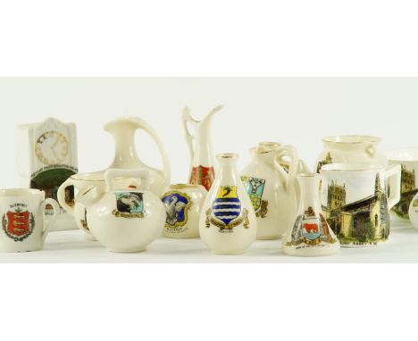 Goss and crested china, including a pig, Arms of Cowes, bronze pot found in Upper Kirkgate, Arms of St Mawgan, longcase clock