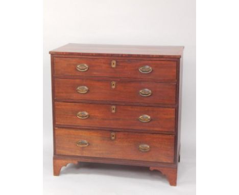 A George III mahogany and rosewood cross banded chest, of four long drawers, raised on bracket feet, 98cm long, 51.5cm deep, 