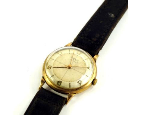 A Rotary gentleman's 9ct gold cased wristwatch, circular silvered dial bearing Arabic numerals, on a leather strap. 
