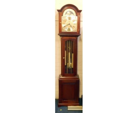 A German mahogany cased longcase clock, brass dial with moon phase, chapter ring bearing Roman numerals, three train movement