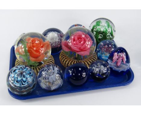 Glass paperweights, including two French weights Le Rosarium, a scattered millefiori weight and a Caithness congratulations w