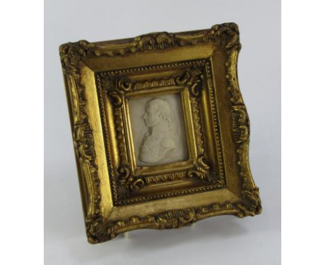 A reconstituted marble cameo bust portrait of Admiral Lord Nelson, in an ornate gilt frame, 7cm x 5.5cm.