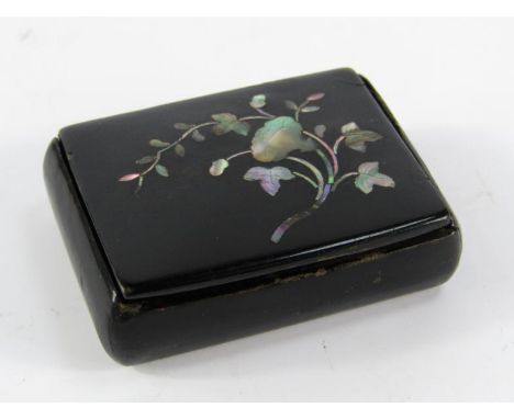 A Victorian papier mache snuff box, with mother of pearl inlaid decorations, 5cm x 4cm x 1.5cm
