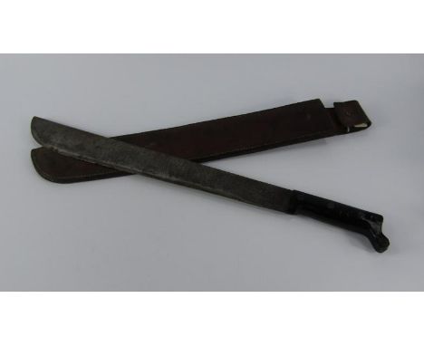 A US Army machete 1943, black grip, impressed marks to blade, in a leather sheath, 61cm long.