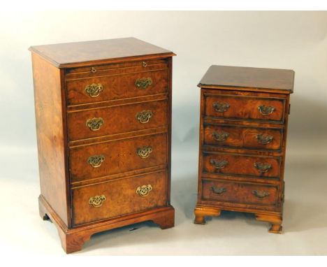 A burr oak hi-fi cabinet, the single door of four dummy drawer fronts and brushing slide, raised on bracket feet, 57.5cm x 44