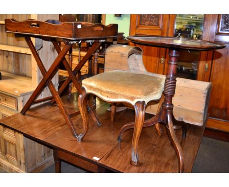 A George III mahogany dish-topped, tilt top tripod table, a 19th century mahogany stool and a 19th century mahogany butlers t