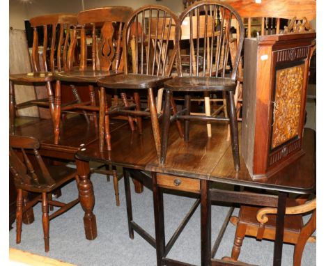 A four division stick stand, a cellarette 1920s oak extending dining table, together with a gate leg dining table, eight vari