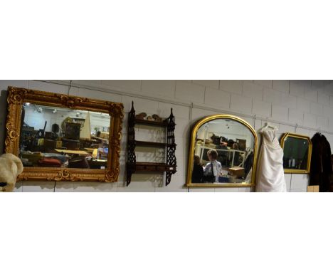 Three mirrors and a wall shelf 