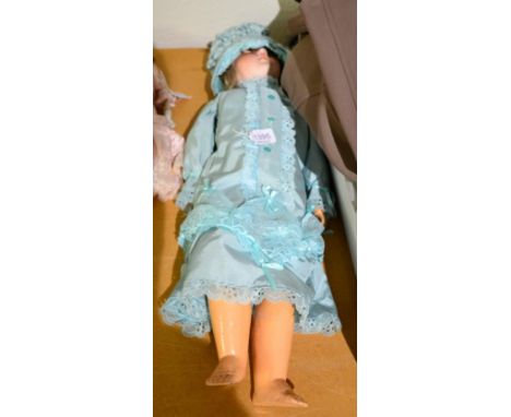 Max Handwerck bisque socket head doll, with sleeping blue eyes, open mouth, composition jointed body, wearing a modern blue d