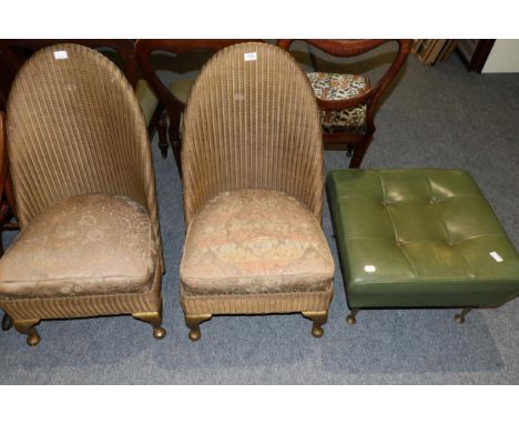 Two Lloyd Loom nursing chairs and a large mock leather pouffe/stool, circa 1950