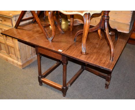 An oak gate leg dining table 