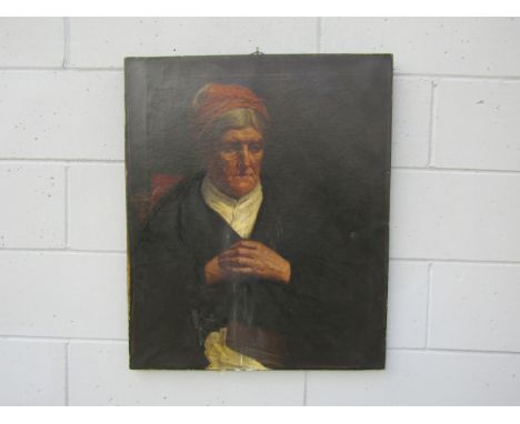 An early 19th century oil on canvas portrait of an elderly woman wearing a red head scarf, black shawl and with a book on her