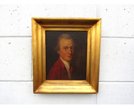 A late 18th / early 19th Century portrait of a gentleman wearing a red jacket and white cravat, oil on canvas laid on wooden 
