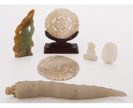 A GROUP OF ASSORTED JADE ITEMS
Comprising: two archaistic carved and pierced roundels, one with stand; an oval pendant with G