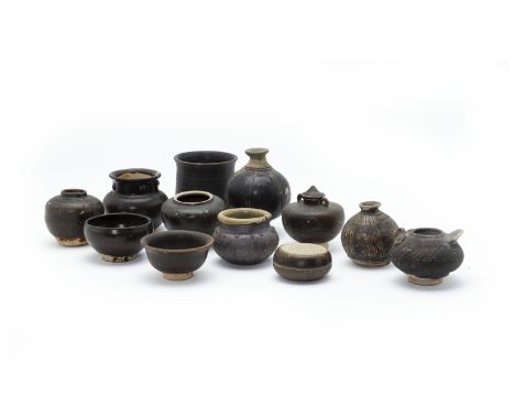 A GROUP OF CAMBODIAN AND OTHER SOUTH EAST ASIAN CERAMICS
To include a jar modelled as a bird; small vases; and bowls, a circu