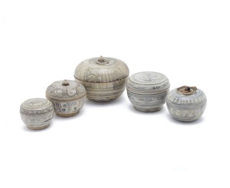 FIVE BLUE AND WHITE STONEWARE BOXES AND COVERS
All with faded underglaze decoration, one with persimmon type top
Largest item