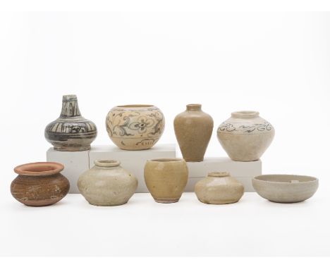 A GROUP OF SOUTHEAST ASIAN CERAMICS
Various celadon glazed jars; a blue and white spherical bowl and jar; a squat bottle vase