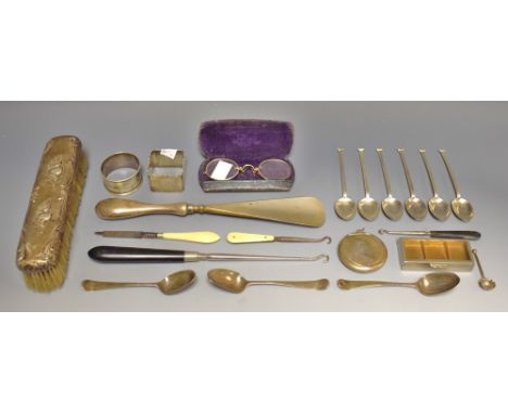 Silver items and plate to include Georgian silver teaspoons; button hooks; silver handled shoe horn; six Arts and Crafts styl