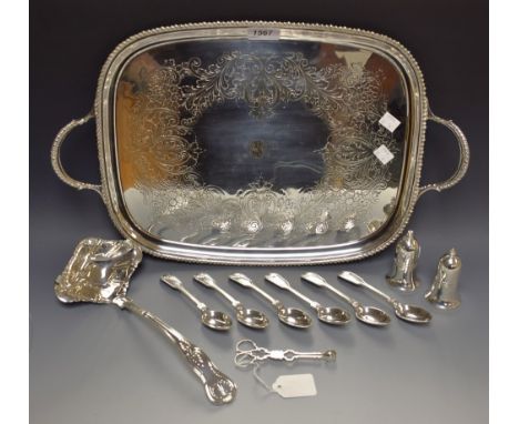 A pair of sugar bows; an EPNS ladle, teaspoons; two handled tray