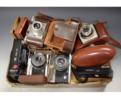 Photographic equipment - a Kodak Colorsnap 35 camera, model 2; a Paxette camera; an Optima 200; Olympus Trip 35; Minolta; a b