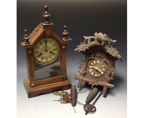 Clocks - an early 20th century carved Bavarian cuckoo clock;  an architectural striking time piece (2)