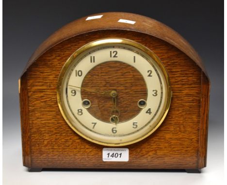 A 20th century oak cased chiming mantel clock, with key