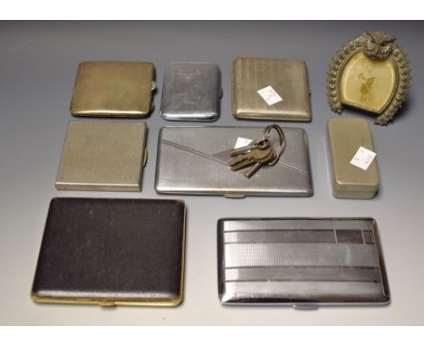 A 1930's silver engine turned cigarette case, Birmingham 1937; others, EPNS; chrome; etc a Victorian owl white metal photogra