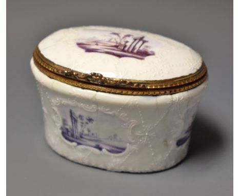 An 18th century enamel oval table snuff box, decorated in puce with vignettes of Classical ruins, on an opaque ground applied