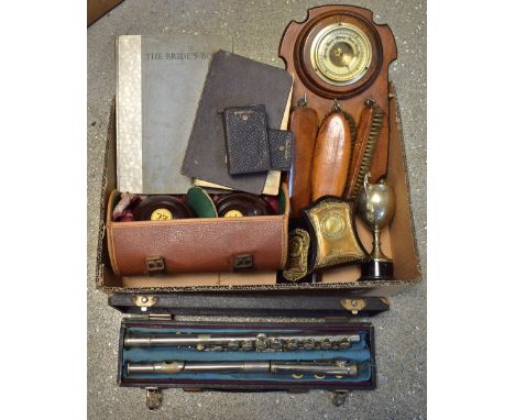 An aneroid barometer with brushes, a set of left hand bowls, a boxed flute; etc
