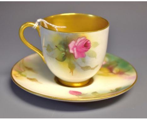 A Royal Worcester cabinet coffee cup and saucer, painted by  M Hunt, and E Spilsbury, signed,  with pink and red cabbage rose