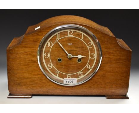 A Smiths oak cased Deco style mantel clock