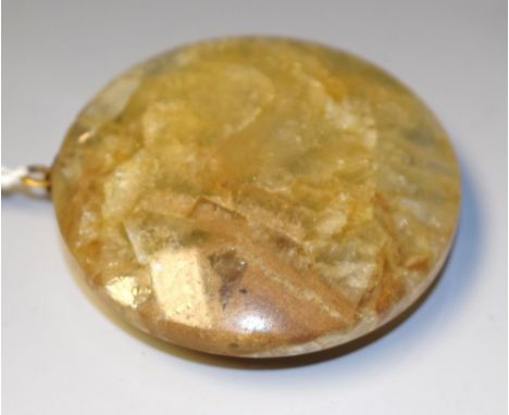 A 19th century Derbyshire fluorspar bun shaped paperweight, gilt ring finial, 6cm diam