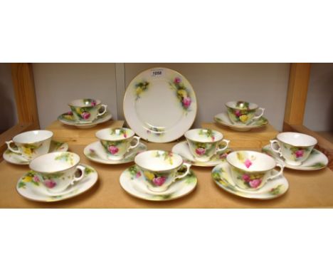 A Royal Worcester part tea service, comprising nine teacups, nine saucers, one side plate, each decorated with yellow and pin